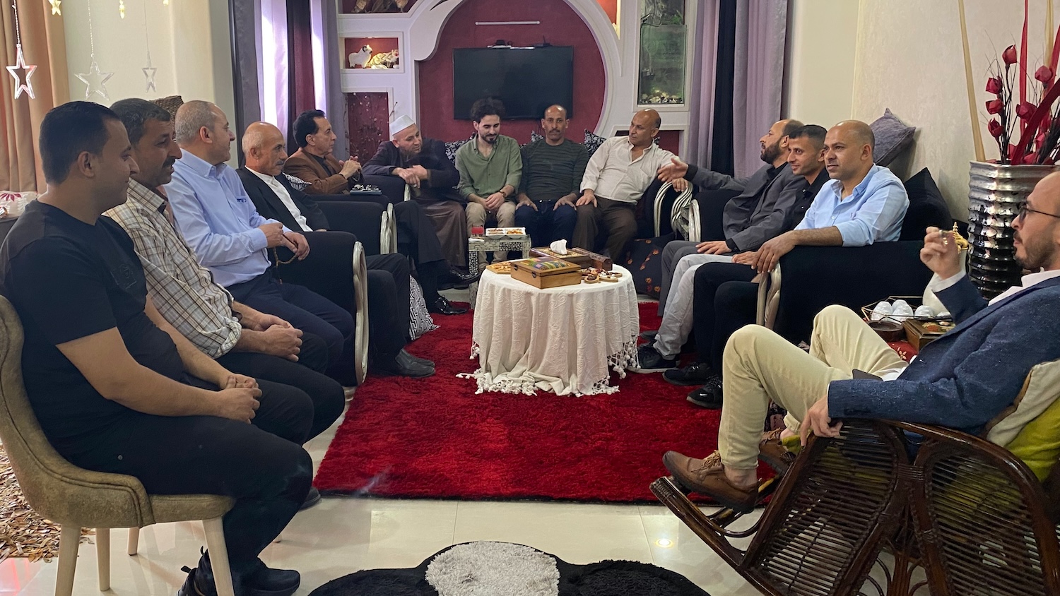 Family members gather for Eid celebrations at the author’s sister’s house in April 2023, a year before it was bombed by Israeli forces during the war on Gaza (Ahmed Dremly/MEE)