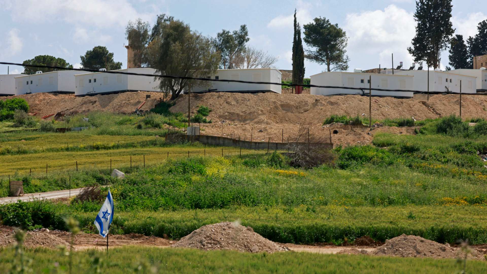 Caravans occupy a hilltop in a settlement south of Jenin in April 2026 (Jaafar Ashtiyeh/AFP)