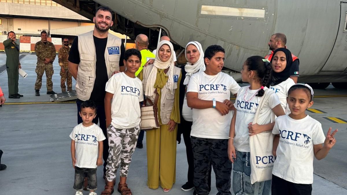 PCRF members and Palestinian children getting evacuated from Egypt to Italy for medical treatment on 9 August 2024 (PCRF)