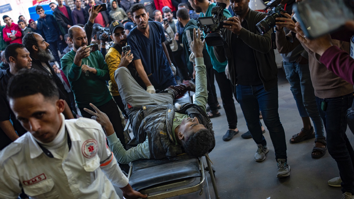 Palestinians wounded in Israeli bombardment of the Gaza Strip are brought to a hospital in Khan Younis, on 1 December 2023.
