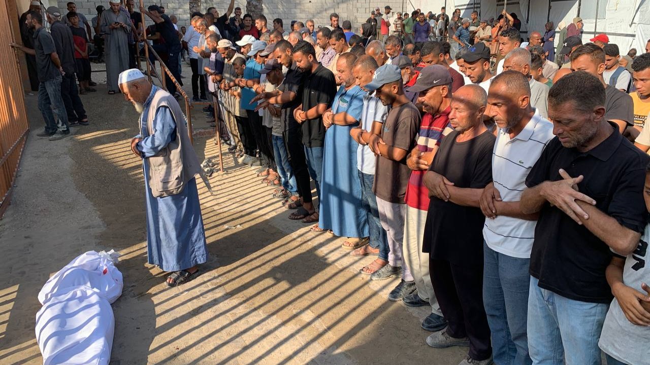 Palestinians mourn 75 year-old Saber al-Zamili, who was killed during a relief airdrop operation in al-Mawasi, south Gaza (MEE/Ahmed Aziz)