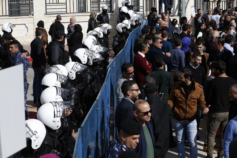 Demonstrators protest PA's proposed social security law (AFP)