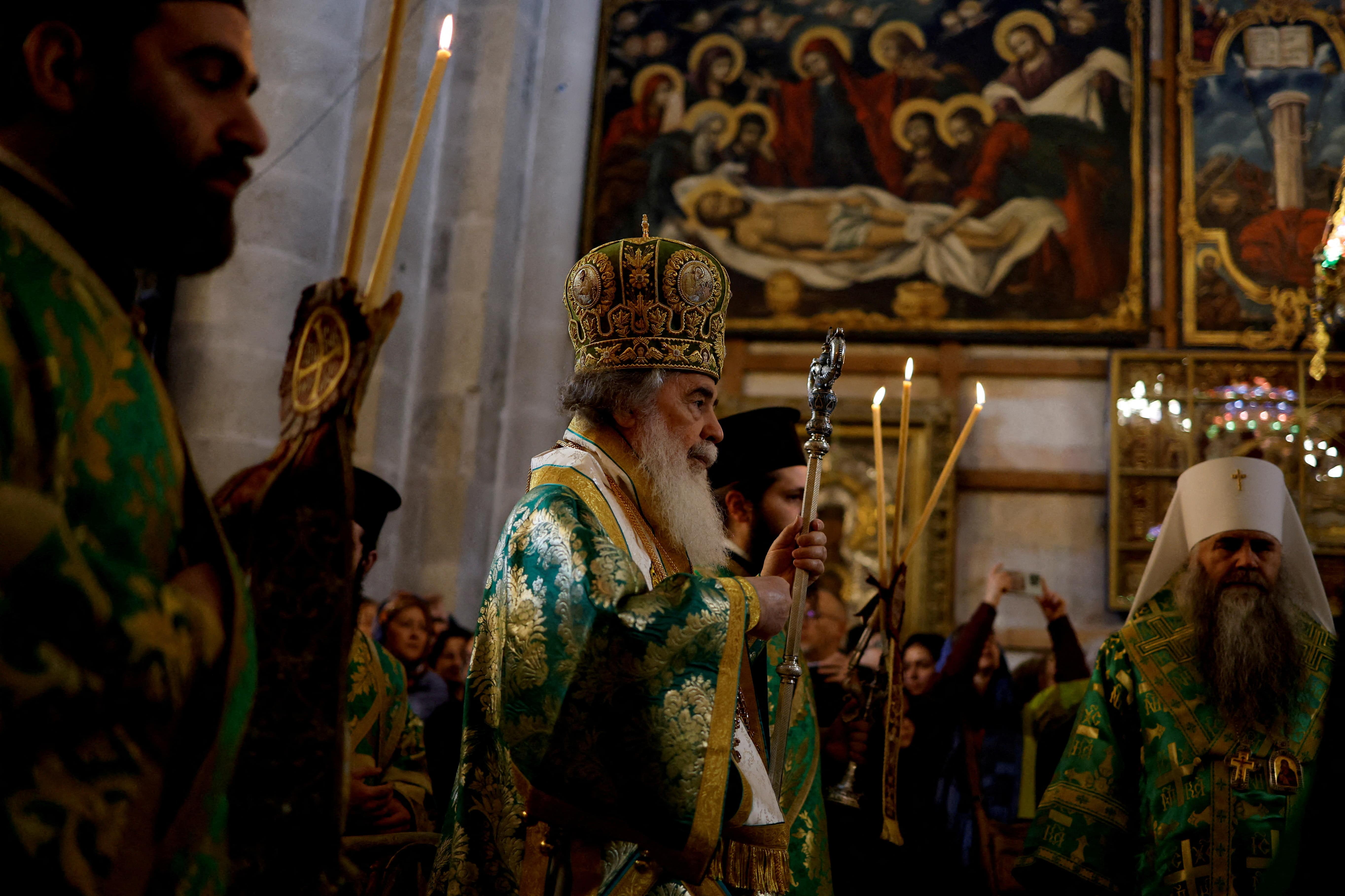 Greek Orthodox Patriarch of Jerusalem Theophilos III attends Palm Sunday service at the Church of the Holy Sepulchre in Jerusalem's Old City on 13 April, 2025 (Reuters/Ammar Awad)