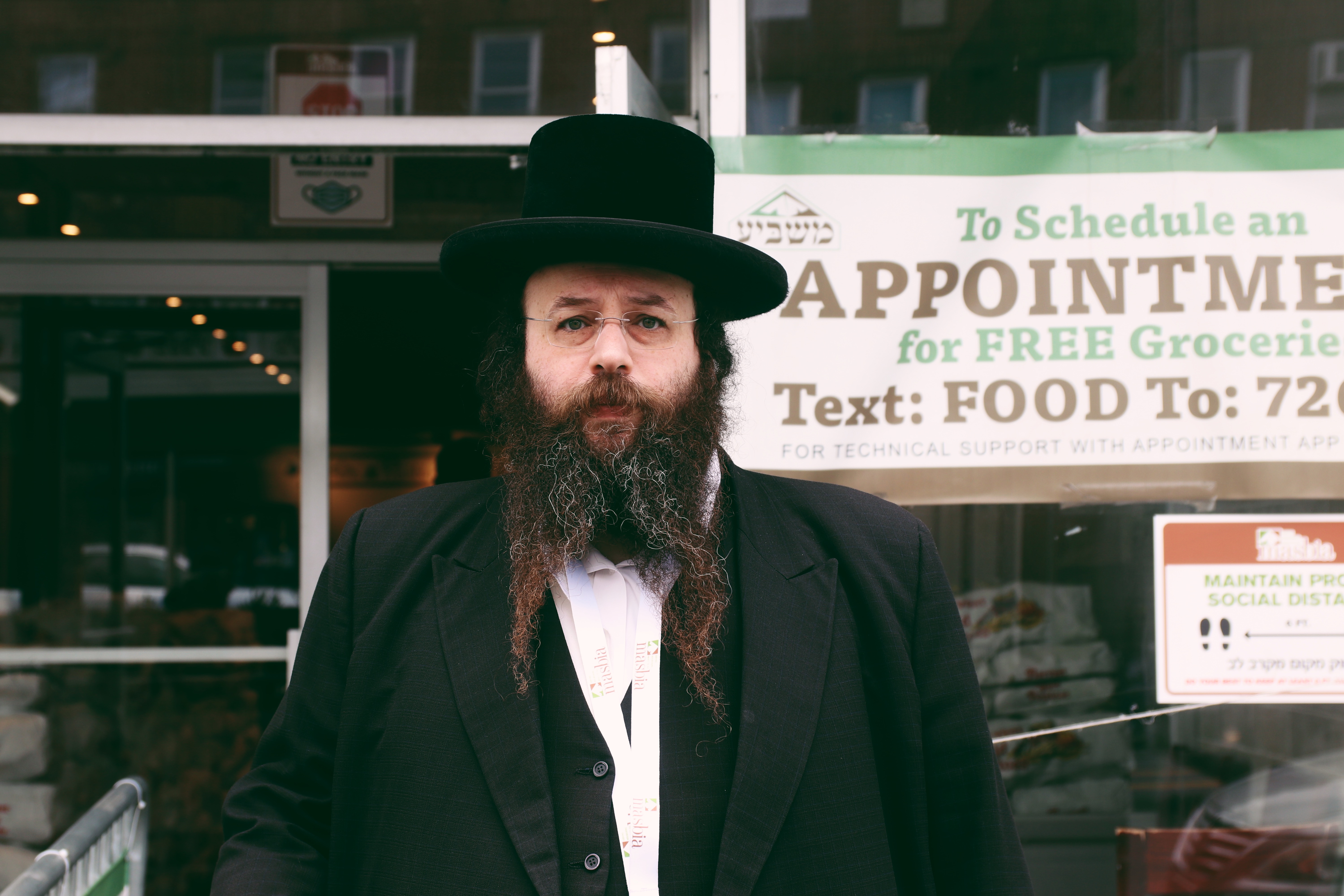 A volunteer at a food pantry in Brooklyn, NY.