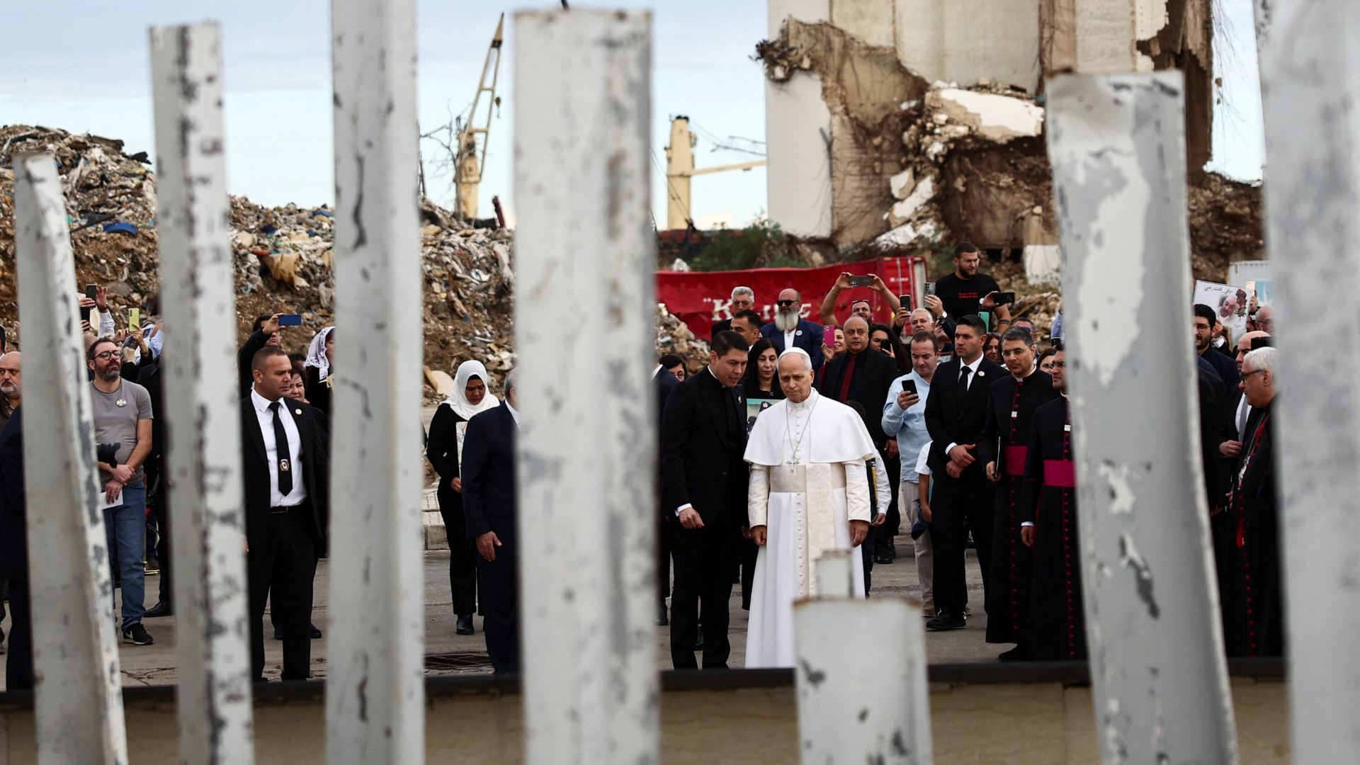 Pope Leo XIV holds a silent prayer at the site of the Beirut port blast in August 2020, in Beirut, 2 December 2025 (Yara Nardi/Reuters)