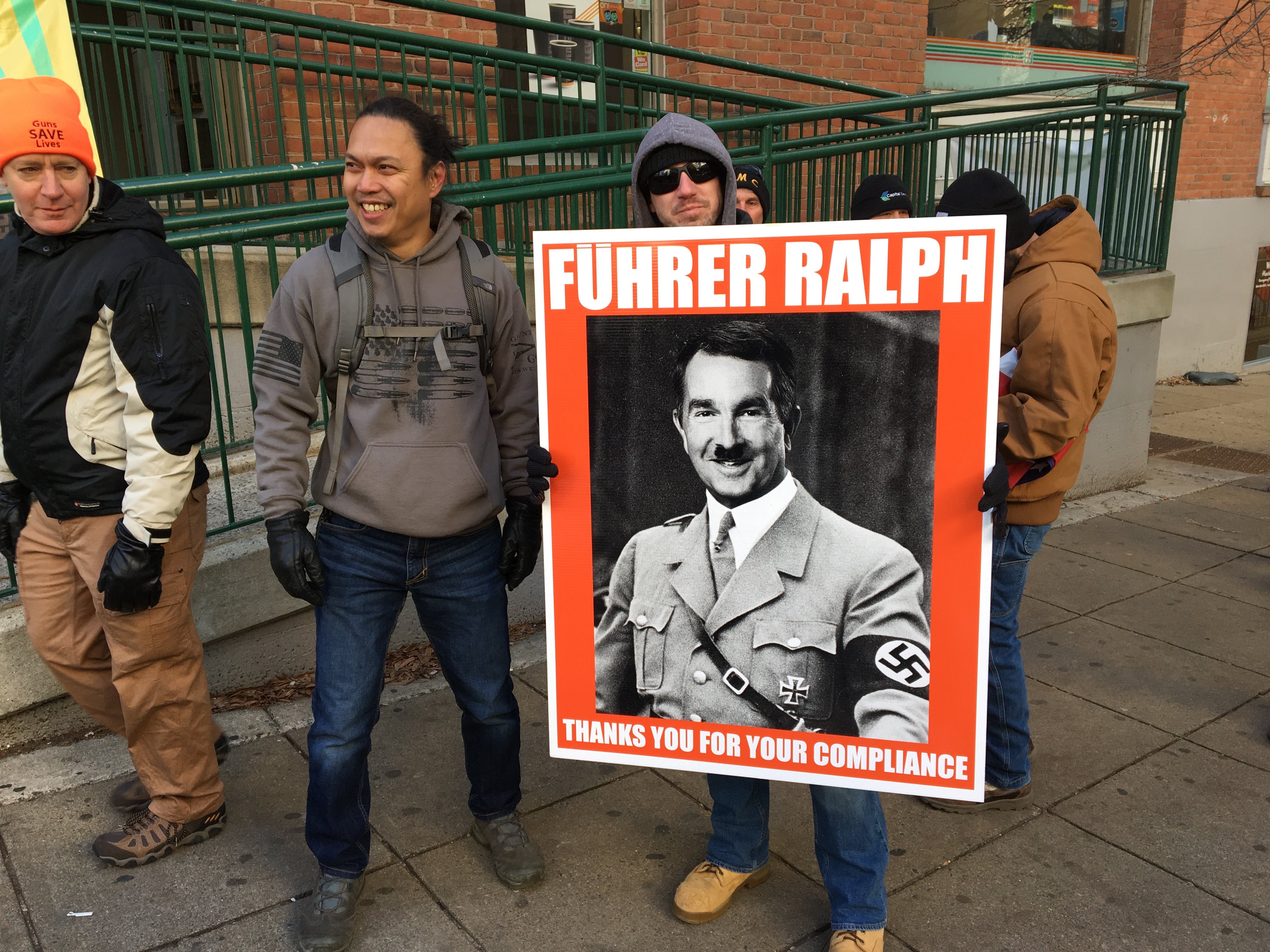 Many of the signs in Richmond on Monday were critical of Virginia's Democratic Governor Ralph Northam (MEE/Sheren Khalel) 