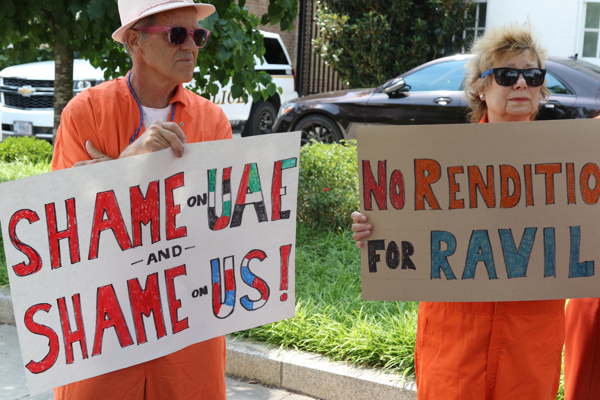 Protesters rally in front of the UAE Cultural Attache in Washington.