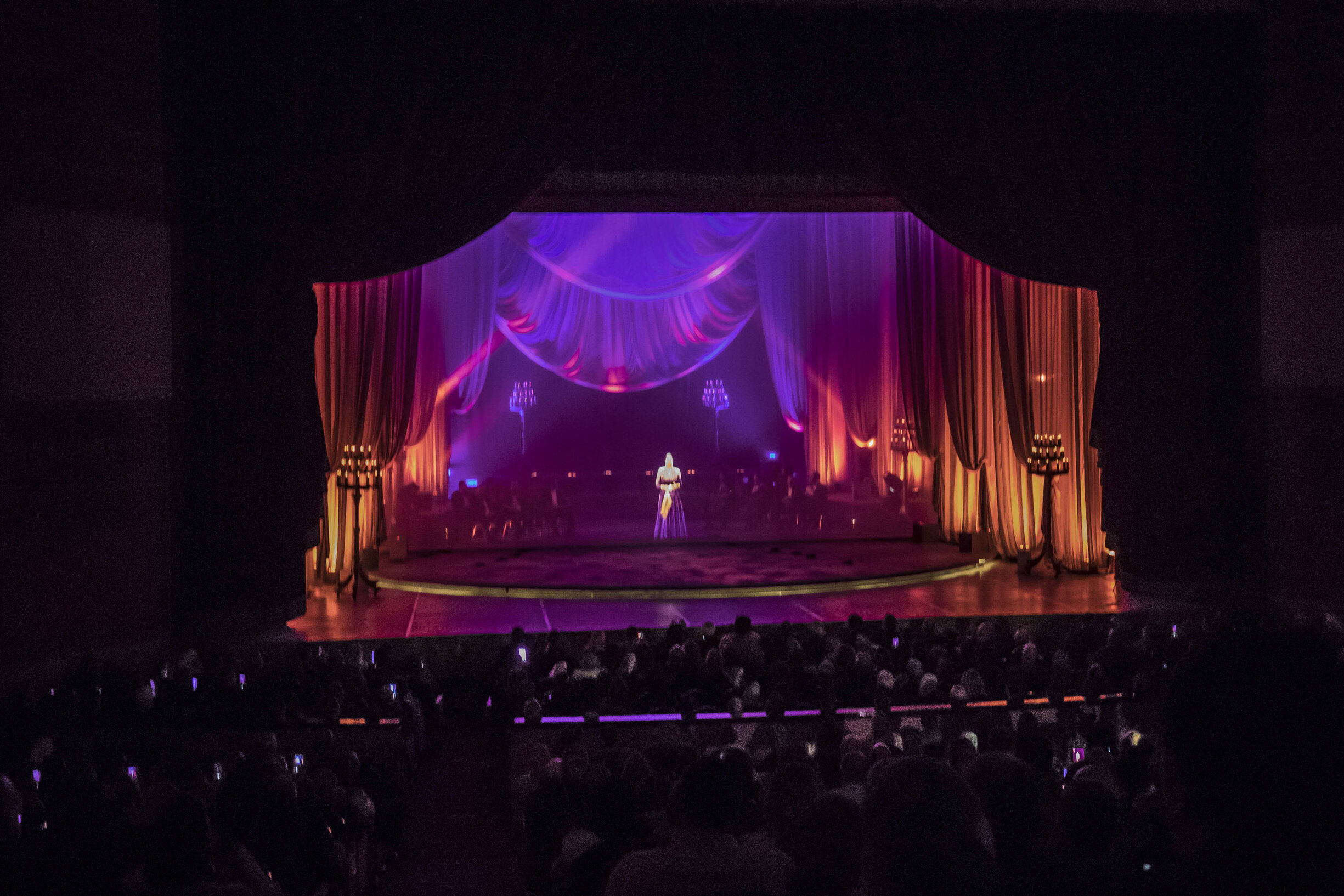 A stage with a projection of a hologram of Oum Khaltoum