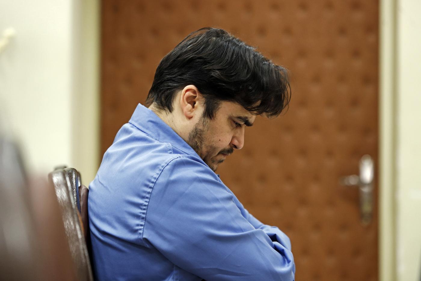 Former opposition figure Ruhollah Zam during his trial at Iran's Revolutionary Court in Tehran. Zam, who was sentenced to death in June, was executed on 12 December (AFP)
