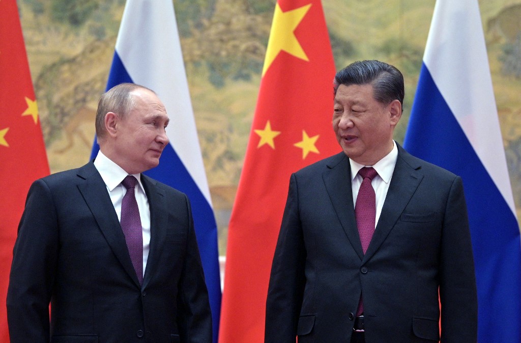 Russian President Vladimir Putin and Chinese President Xi Jinping meet in Beijing on 4 February 2022 (AFP)