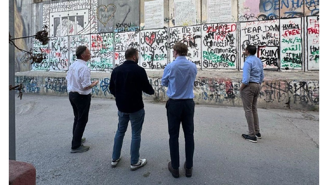 Andrew George and Shaukat Adam separation wall 