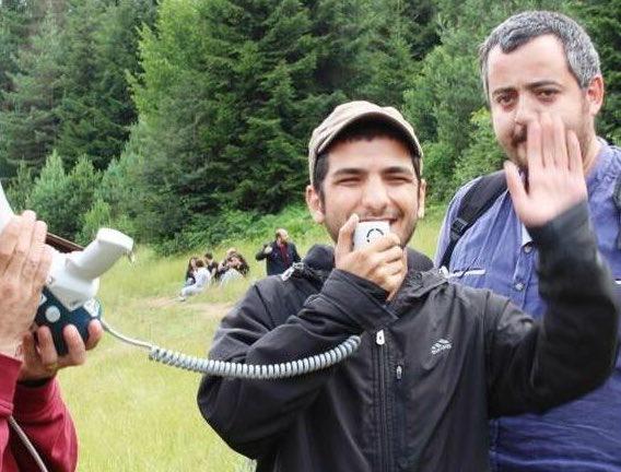 Sercan Dede speaking at a protest (MEE/Sercan Dede)