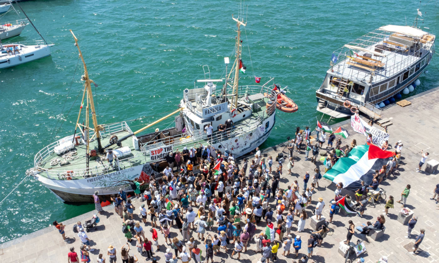 Crowds gather around the Freedom Flotilla ship Handala in Syracuse, Sicily, in July 2025 (AFP)