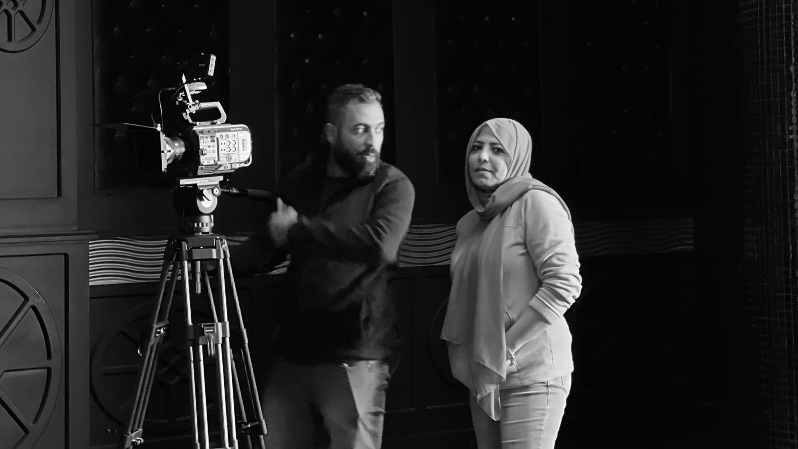 Suadad al-Sahly with a cameraman in Iraq (MEE)