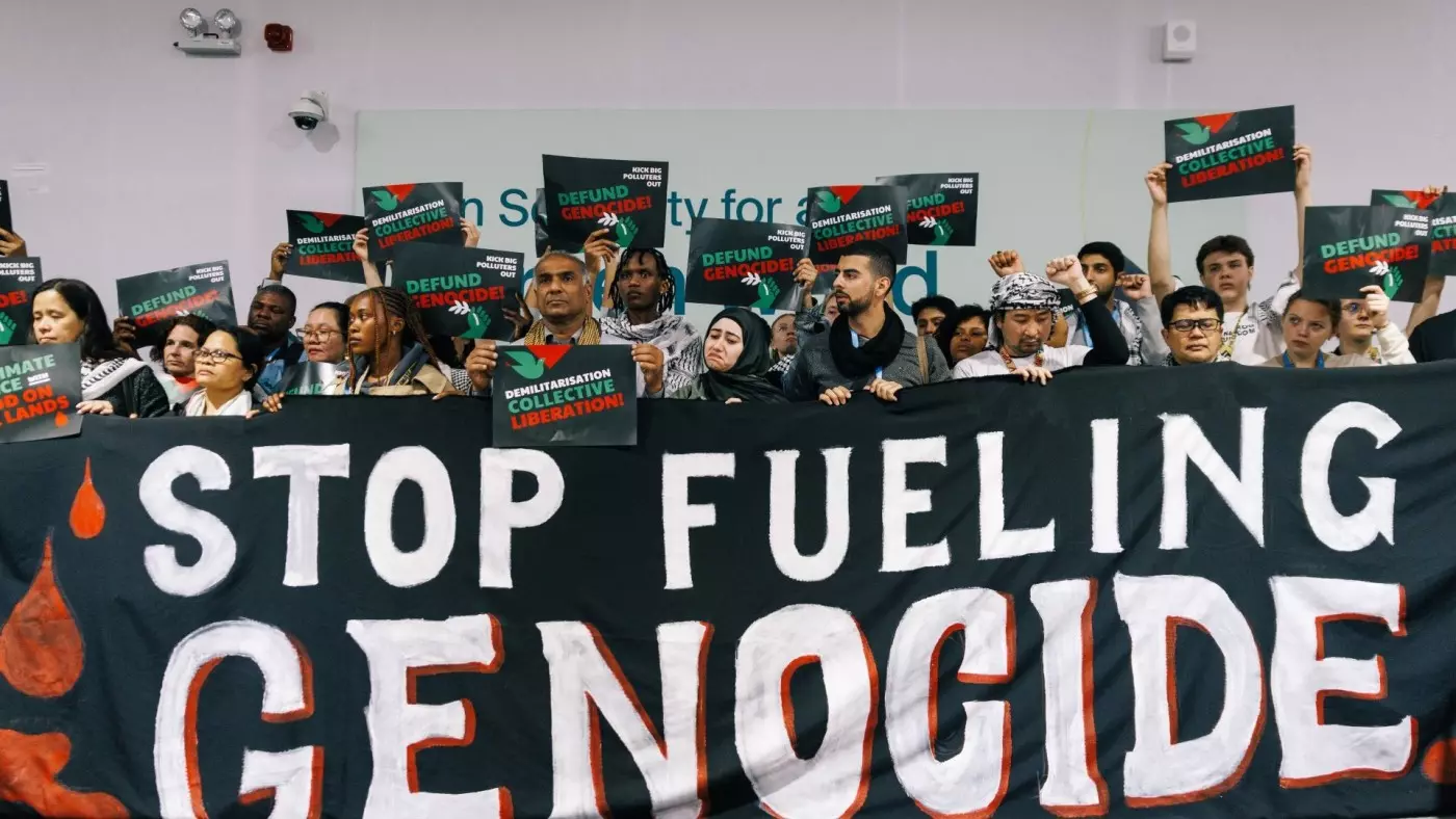 Protesters calling for a halt to arms sales to Israel in front of the central train station in Berlin, 18 October 2024 (Stephane Lelarge/AFP)