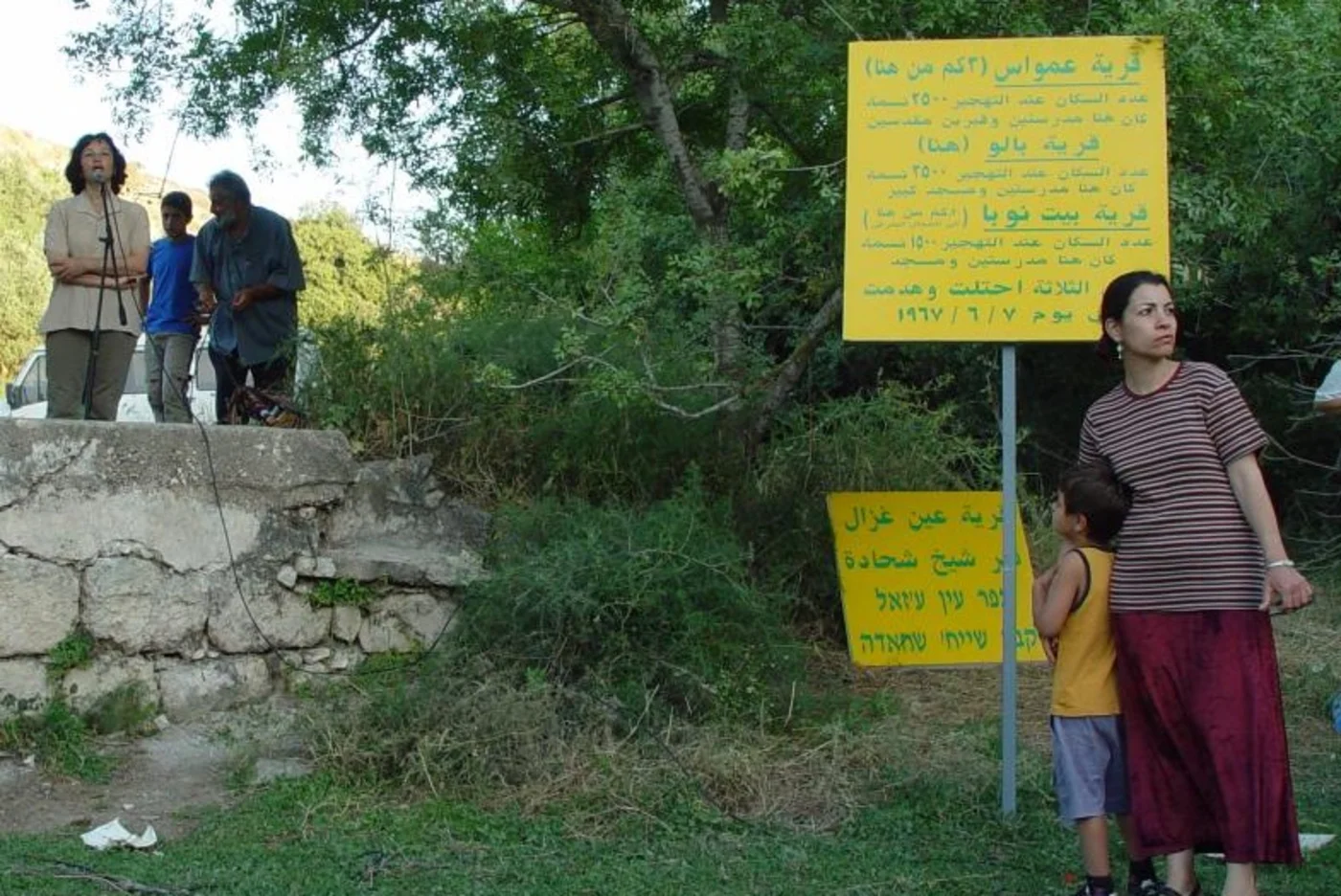 Peace activists remember the war crimes committed in Yalu (Photo by: Ayman Nimer/Palestineremembered.com)