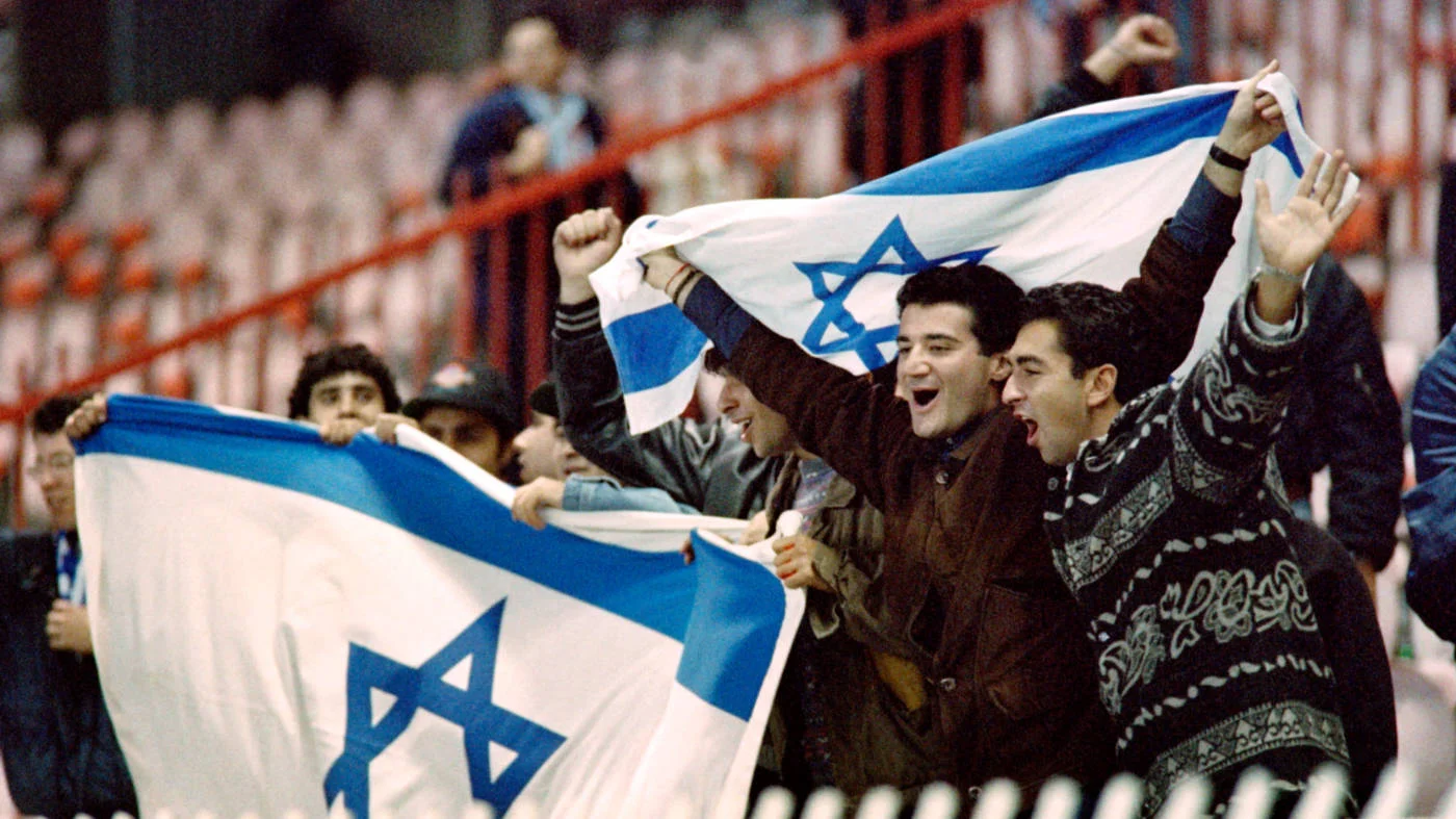 Israeli supporters after their team defeated France 3-2 in their World Cup qualifying match in Paris in October 1993 (AFP)