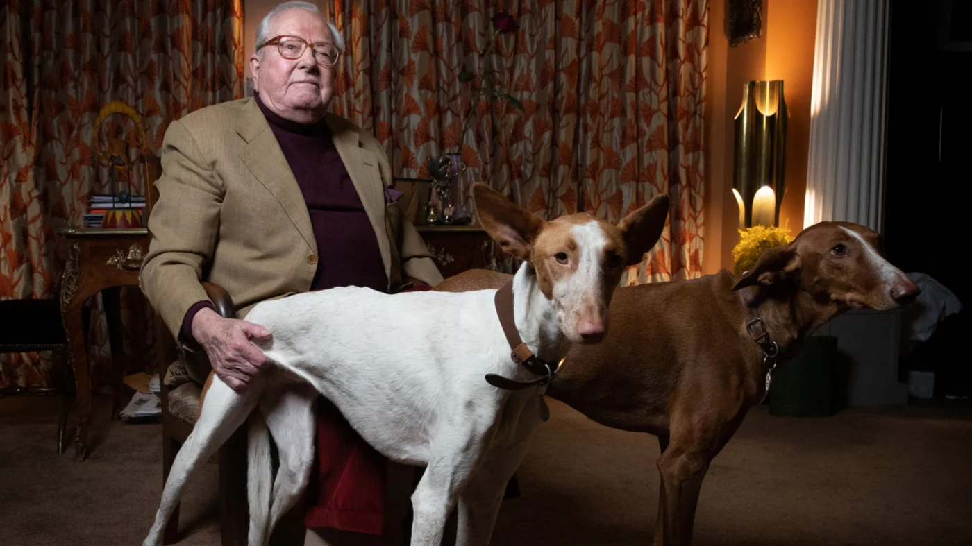 Jean-Marie Le Pen poses with his dogs at his home in Rueil-Malmaison, west of Paris, on 2 February 2022 (AFP).