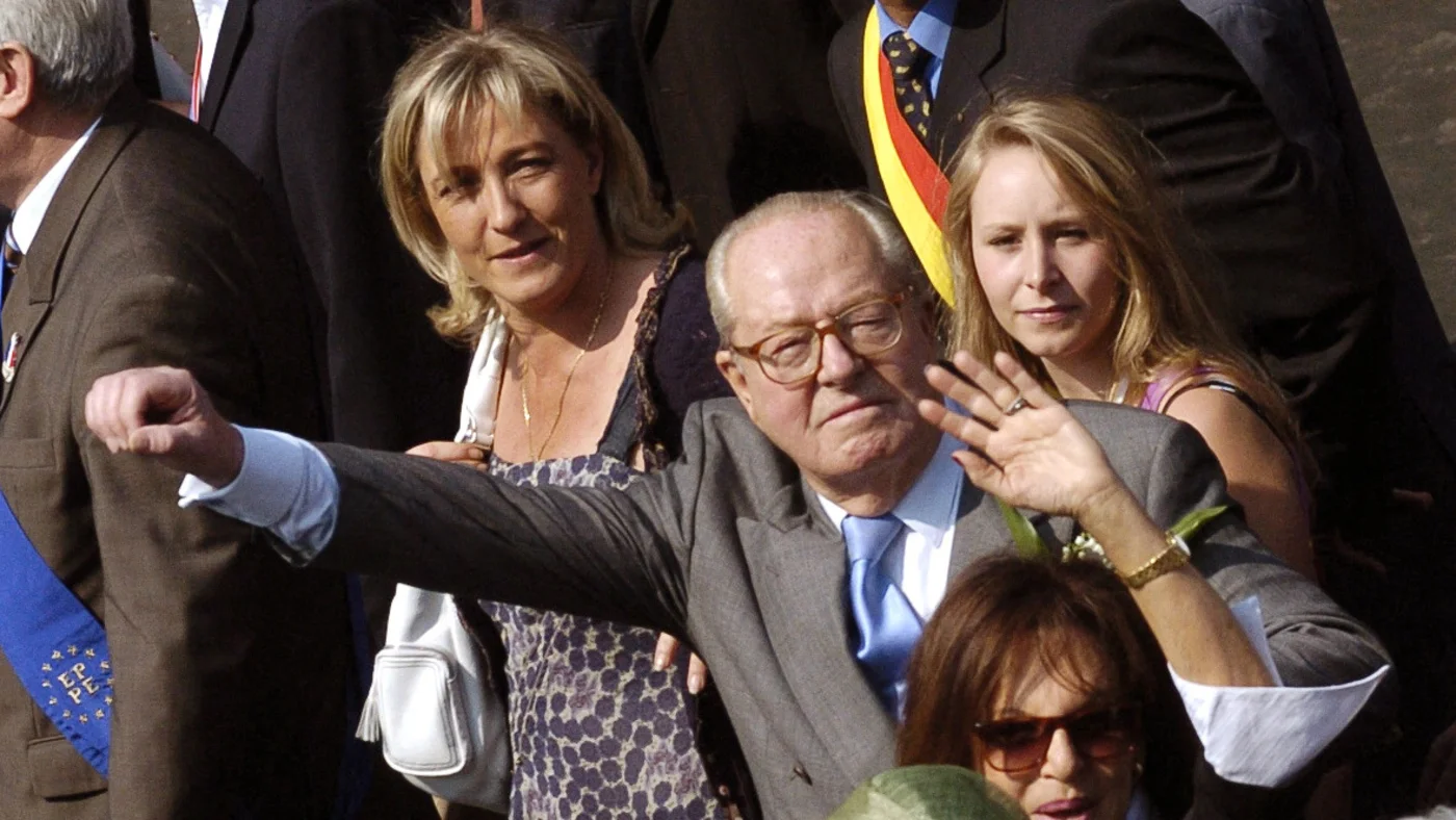 Jean-Marie Le Pen pictured with his daughter Marine (left) and granddaughter Marion Marechal (right) before giving a speech in Paris’ Place de l'Opera in May 2007 (AFP).Jean-Marie Le Pen pictured with his daughter Marine (left) and granddaughter Marion Marechal (right) before giving a speech in Paris’ Place de l'Opera in May 2007 (AFP).
