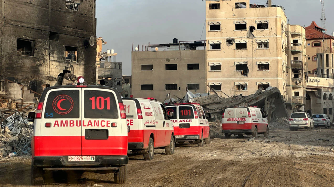 Ambulances evacuate patients from Nasser hospital in Khan Yunis, Gaza, during a joint WHO-Ocha-Palestinian Red Crescent mission on 20 February 2024 (AFP/WHO handout)