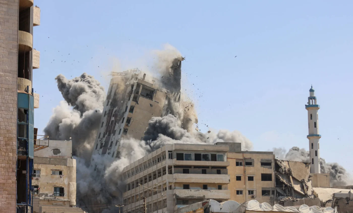 An Israeli air strike destroys the al-Ghafari tower in Gaza in September 2025 (AFP)