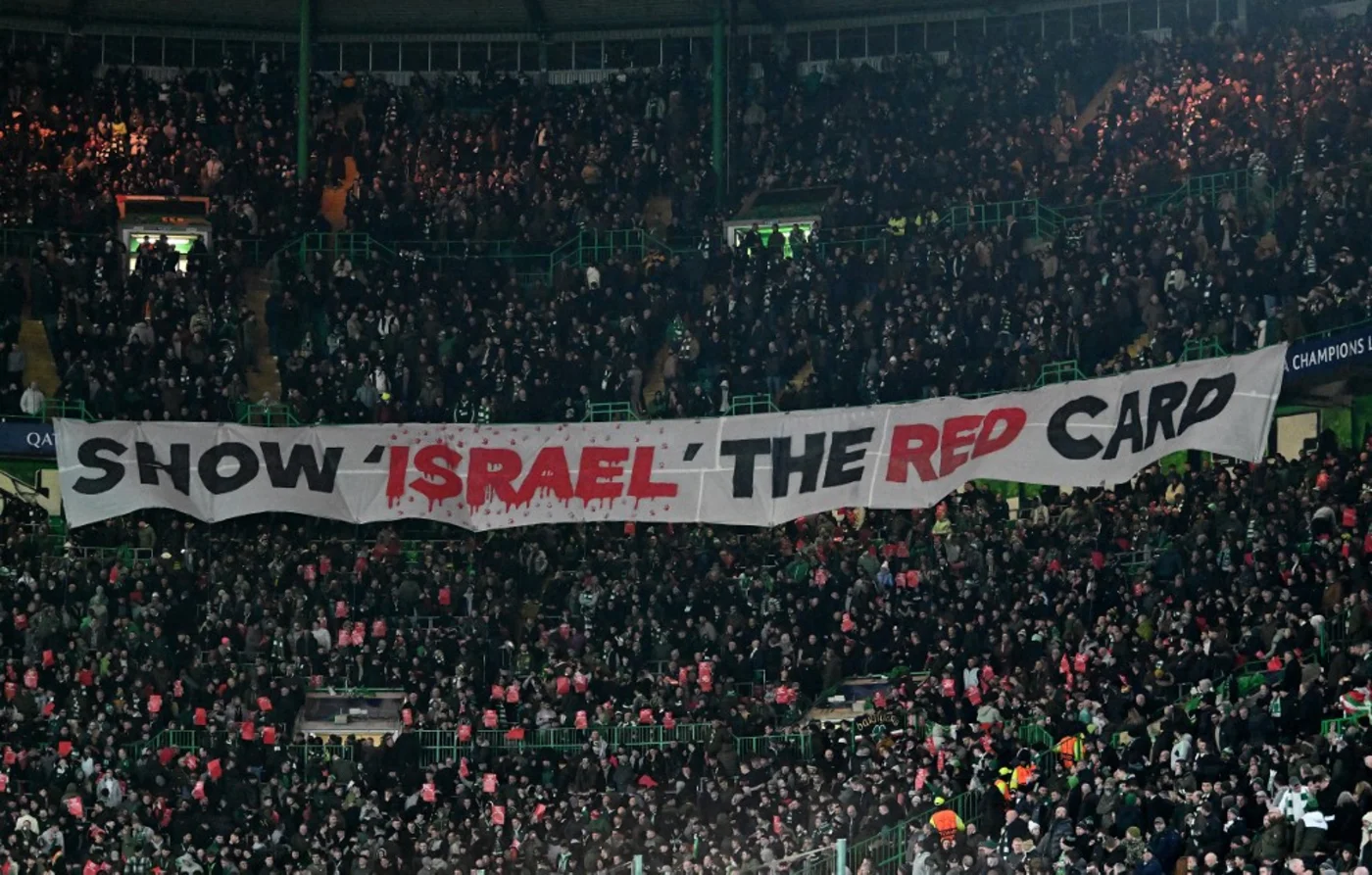 Celtic fans unfurl a 