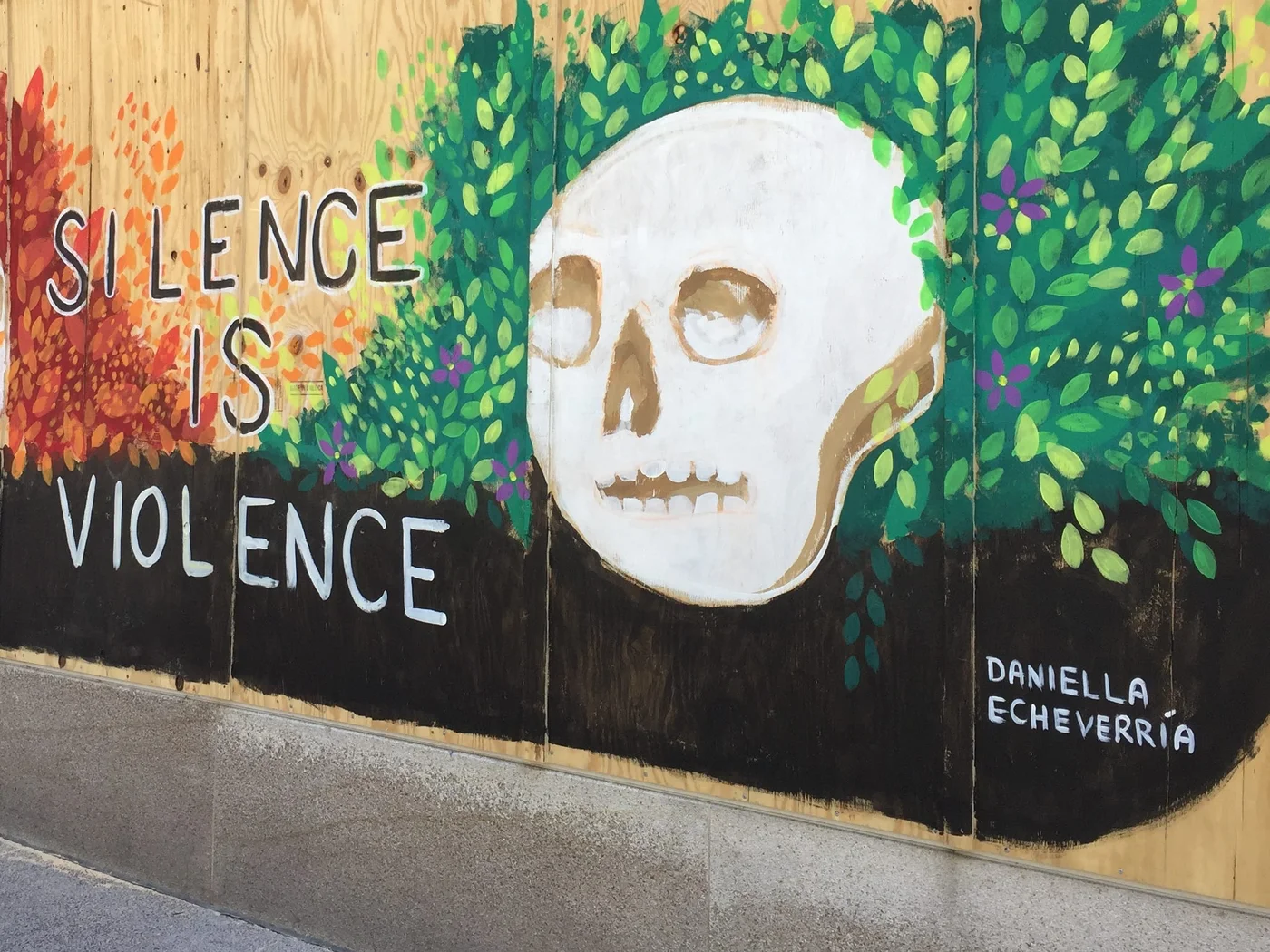 Artwork carrying messages of peace as seen in this mural in Madison, Wisconsin, by Daniella Echeverria on 7 June (Reuters)