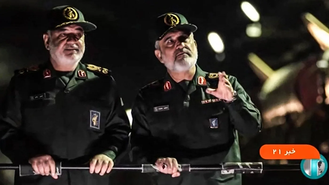 Major General Amir Ali Hajizade (right), tours an underground missile base with Major General Hossein Salami in this image from Iran state TV, taken in January 2025 (IRIB news agency/AFP)