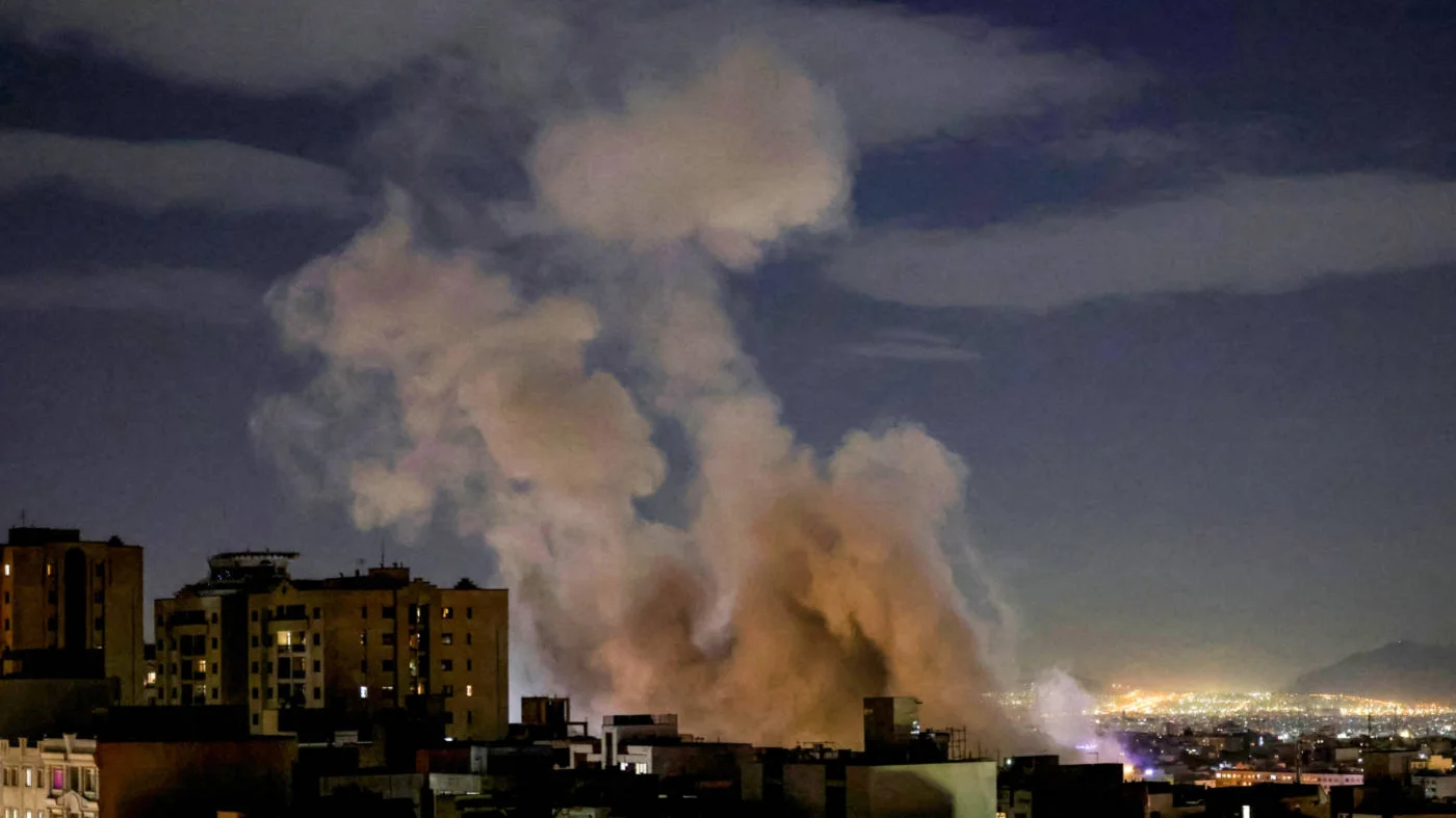 A smoke plume rises following a missile strike on a building in Tehran in March 2026 amid US and Israeli attacks on the country (AFP)