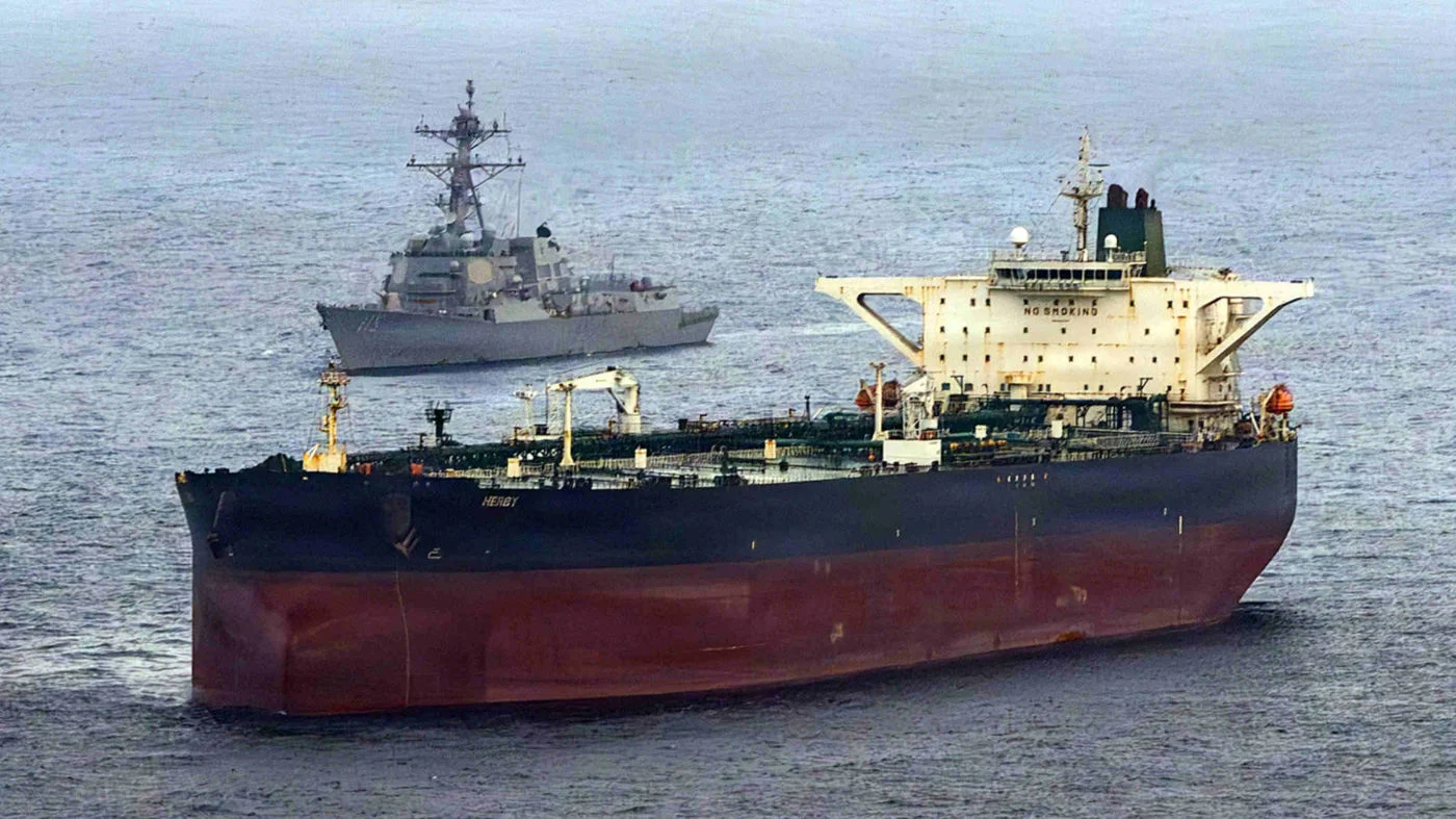 In this US Navy handout, the USS Rafael Peralta implements a maritime blockade against the Iran-flagged crude oil tanker vessel off the coast of Iran on 24 April 2026 (via AFP)