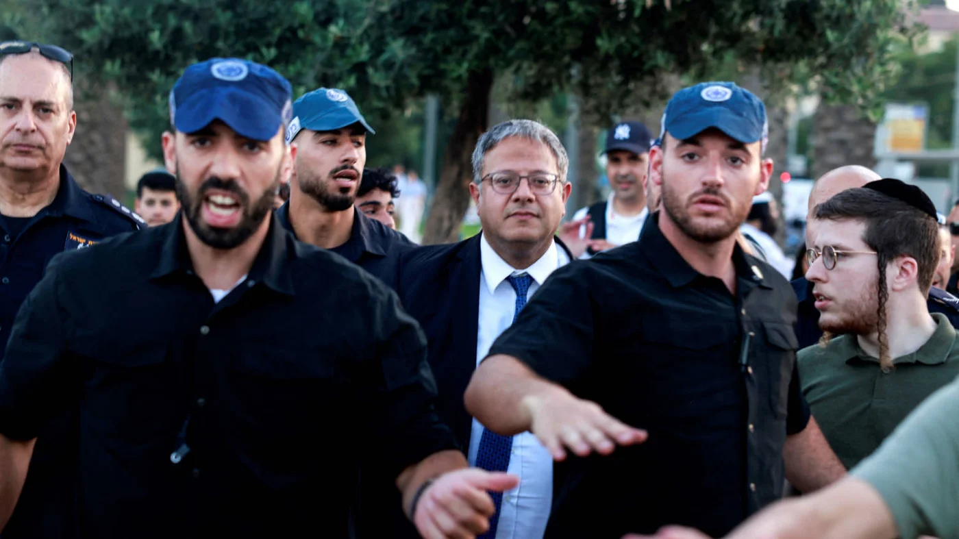National Security Minister Itamar Ben-Gvir, surrounded by security, at Jerusalem's Damascus Gate on 5 June 2024, known by Israelis as Jerusalem Day (AFP)