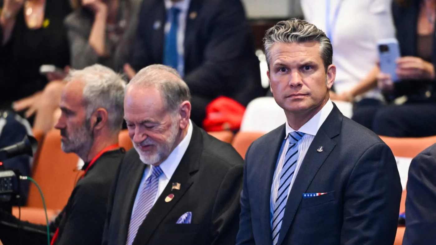 US Ambassador to Israel Mike Huckabee (left) and US Defense Secretary Pete Hegseth in the Knesset, Jerusalem, in October 2025 (AFP)