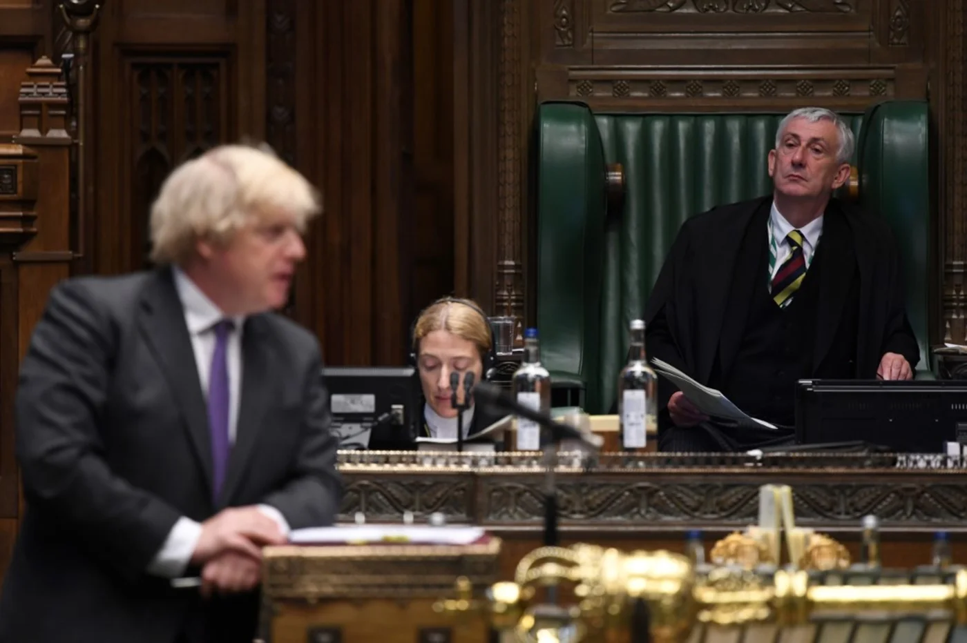 The House Speaker presides as Johnson answers questions in the House of Commons in London on 24 June (Jessica Taylor/UK Parliament/AFP)