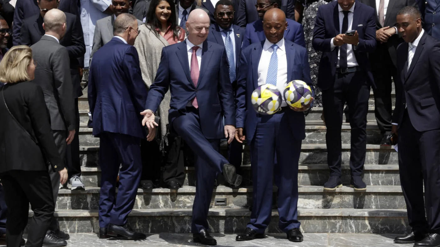 President of FIFA Gianni Infantino kicks a ball during the inauguration of the FIFA offices in Rabat, Morocco, on 26 July 2025 (AFP)