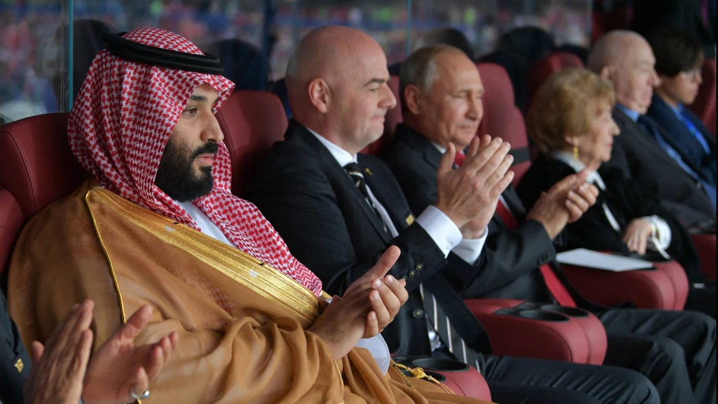 Saudi Crown Prince Mohammed bin Salman, FIFA president Gianni Infantino and Russian President Vladimir Putin attend the 2018 World Cup Group in Moscow on 14 June 2018 (AFP)