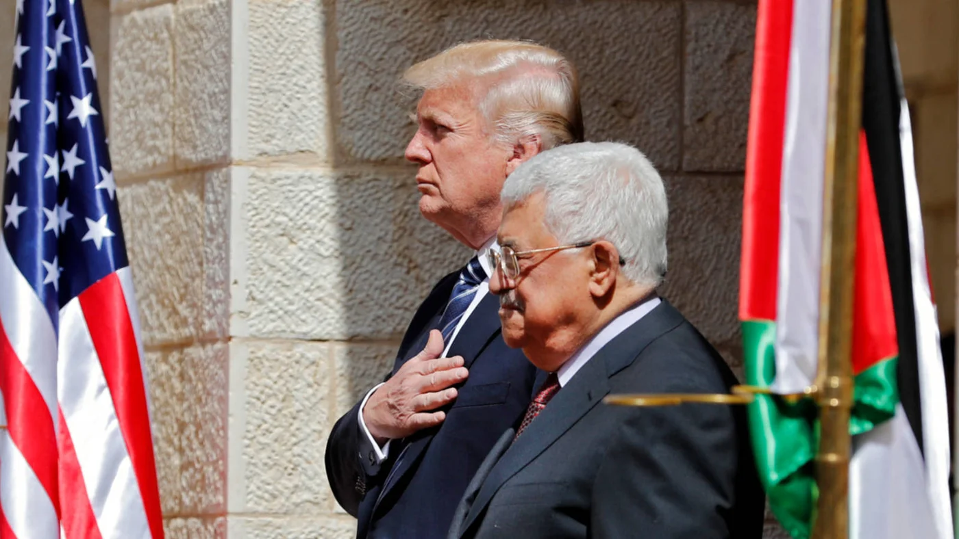 Palestinian Authority President Mahmoud Abbas meets with US President Donald Trump in Bethlehem in May 2017 (AFP)