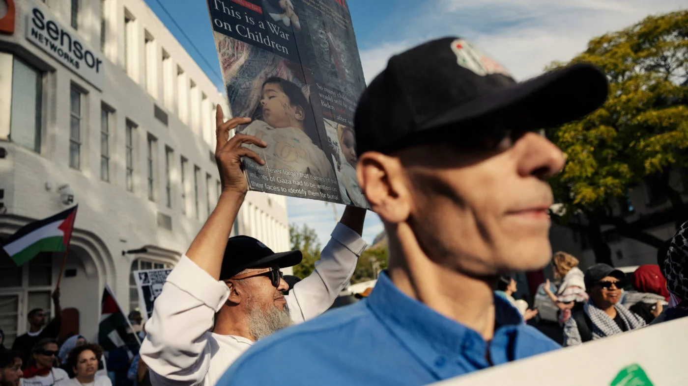 Members of South African Jews for a Free Palestine group and pro-Palestinian supporters protest against a South African Zionist Federation Conference in Cape Town in March 2025 (AFP)