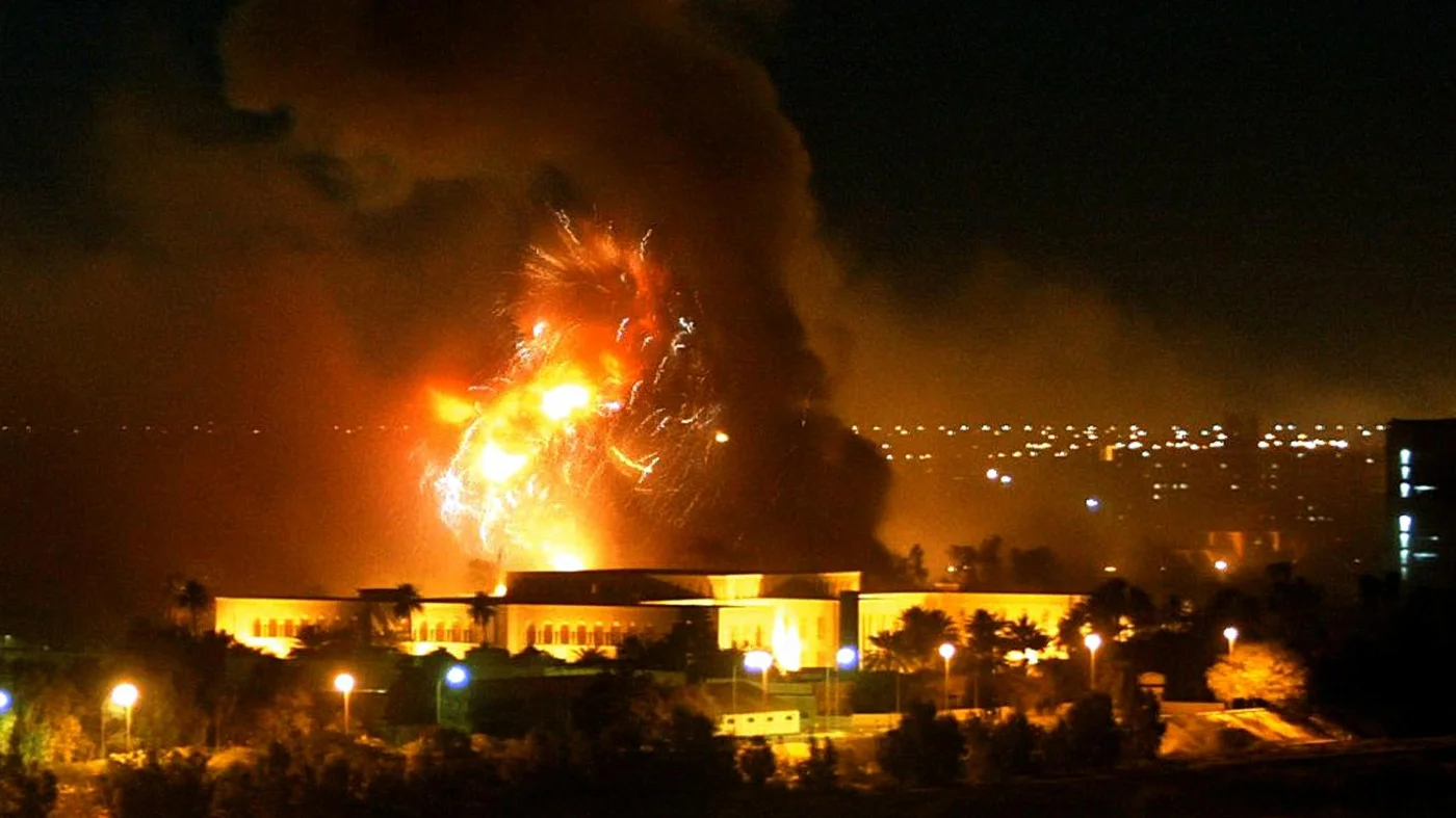 Smoke covers the presidential palace compound in Baghdad on 21 March 2003 during a massive US-led air raid on the Iraqi capital (AFP)