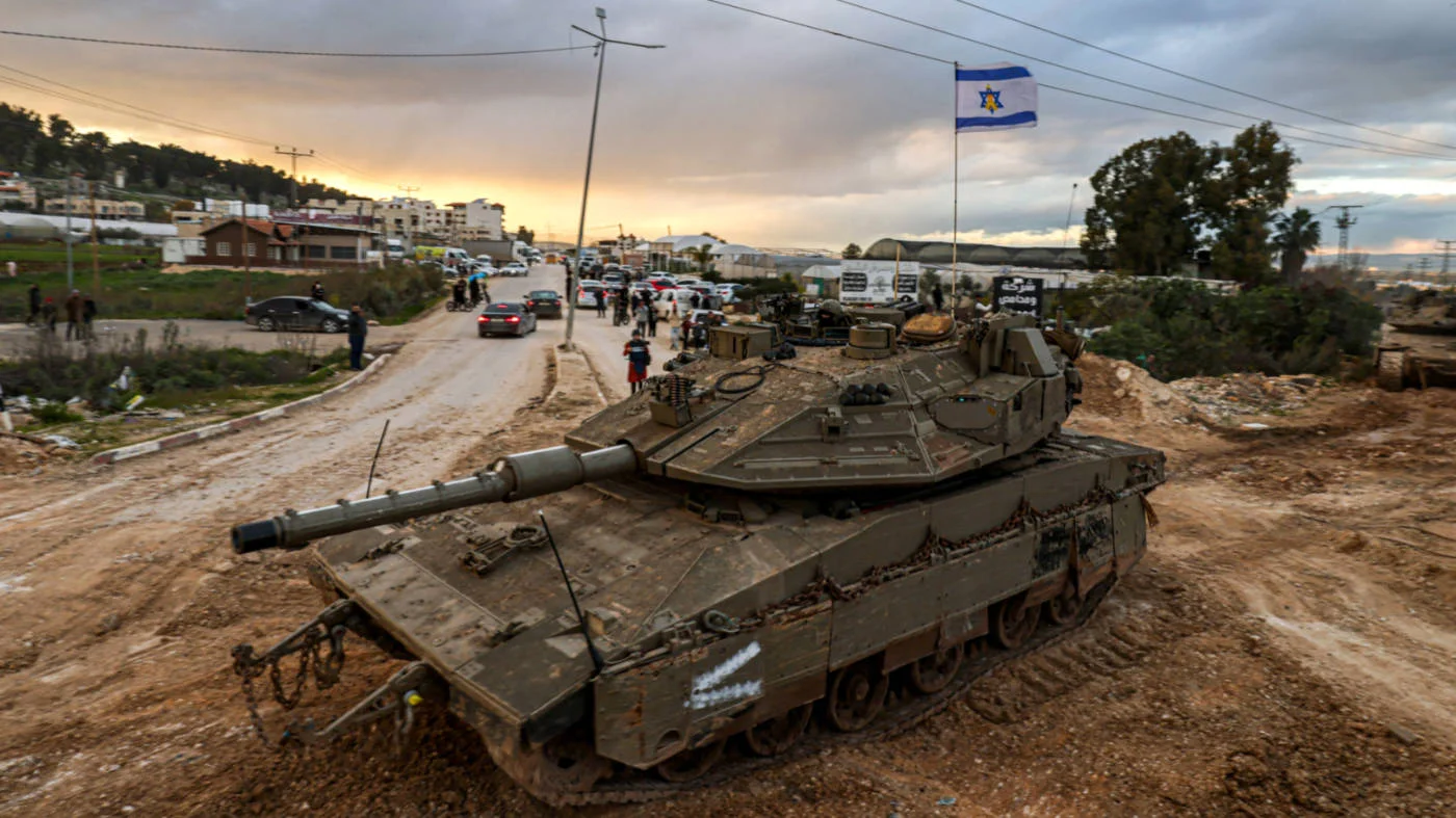 Israeli tanks enter the Jenin camp for Palestinian refugees in the occupied West Bank, on 23 February 2025 (AFP)