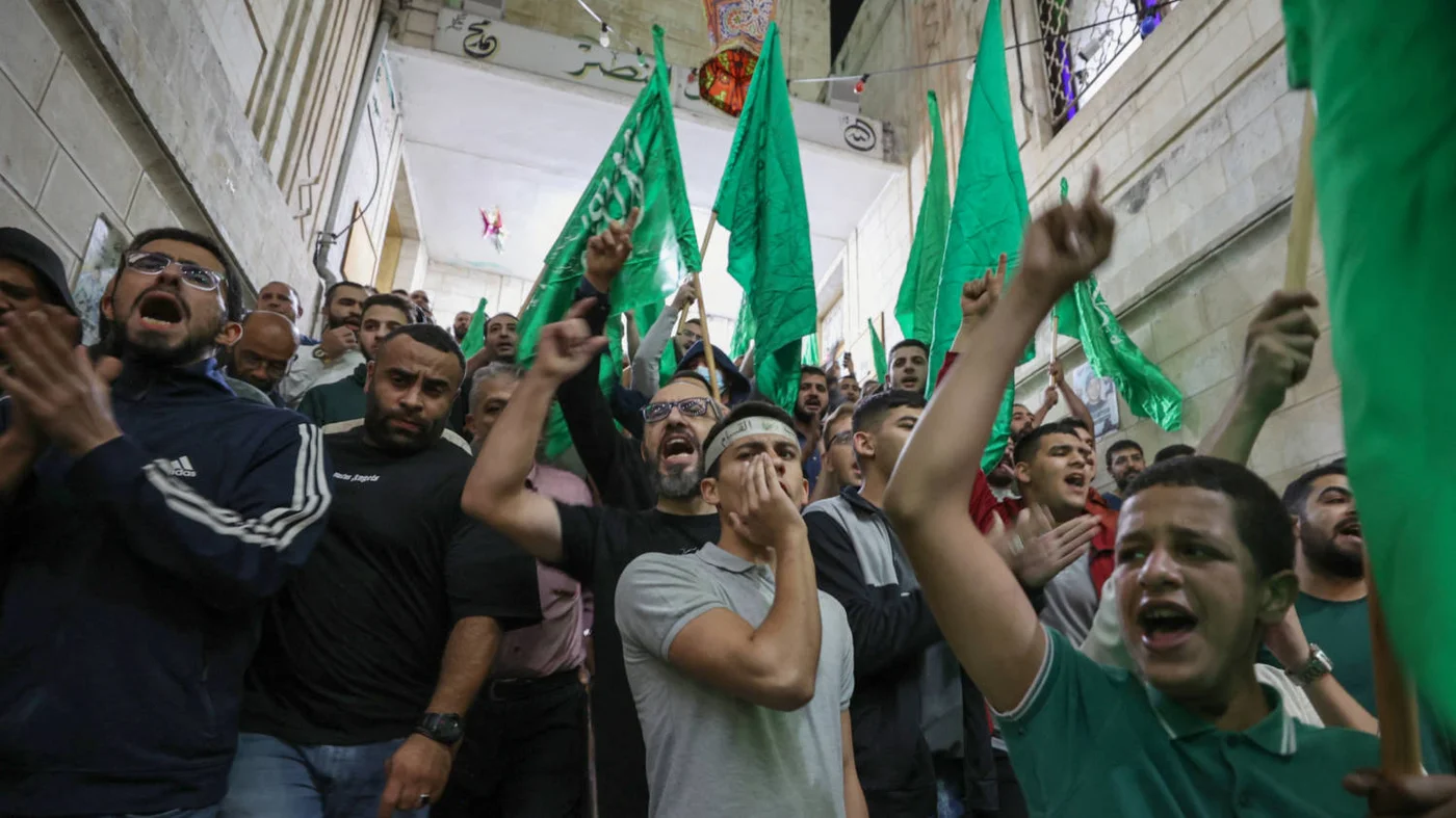 Palestinian supporters of Hamas protest in Nablus, occupied West Bank, on 17 October 2023 at a blast which ripped through a Gaza hospital killing hundreds (AFP)