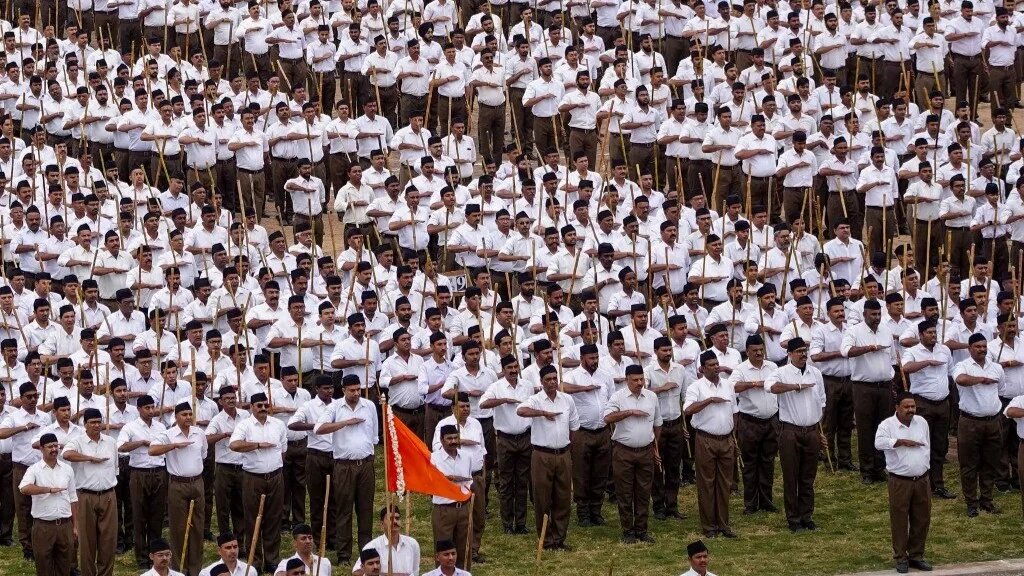 Members of the Rashtriya Swayamsevak Sangh (RSS), a Hindu nationalist organisation, take part in a route-march in Ajmer on February 4, 2024 (AFP)