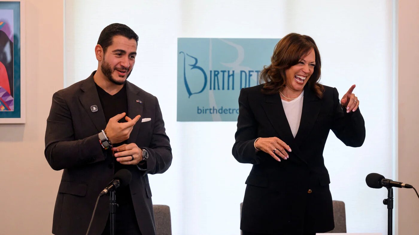 Michigan Senate candidate Abdul El-Sayed and former US Vice President Kamala Harris share a laugh at a campaign event in Detroit, on 22 September 2026 (David Guralnick/Pool/Getty Images via AFP)