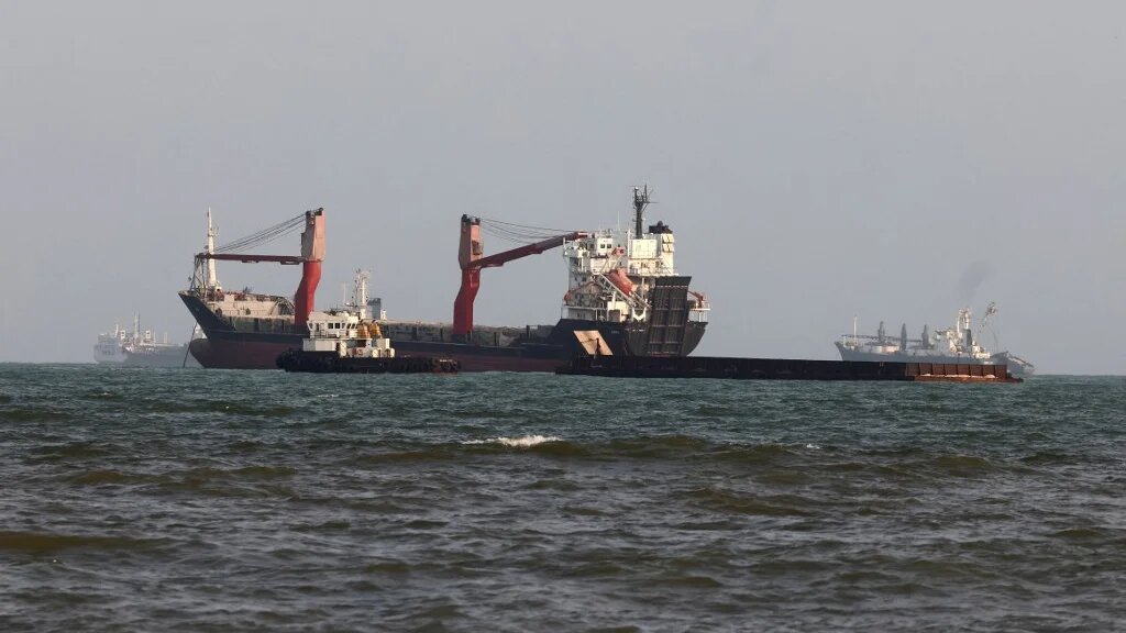 Vessels are seen in the Strait of Hormuz, off the port city of Bandar Abbas in southern Iran, on 10 August 2026. (AFP)