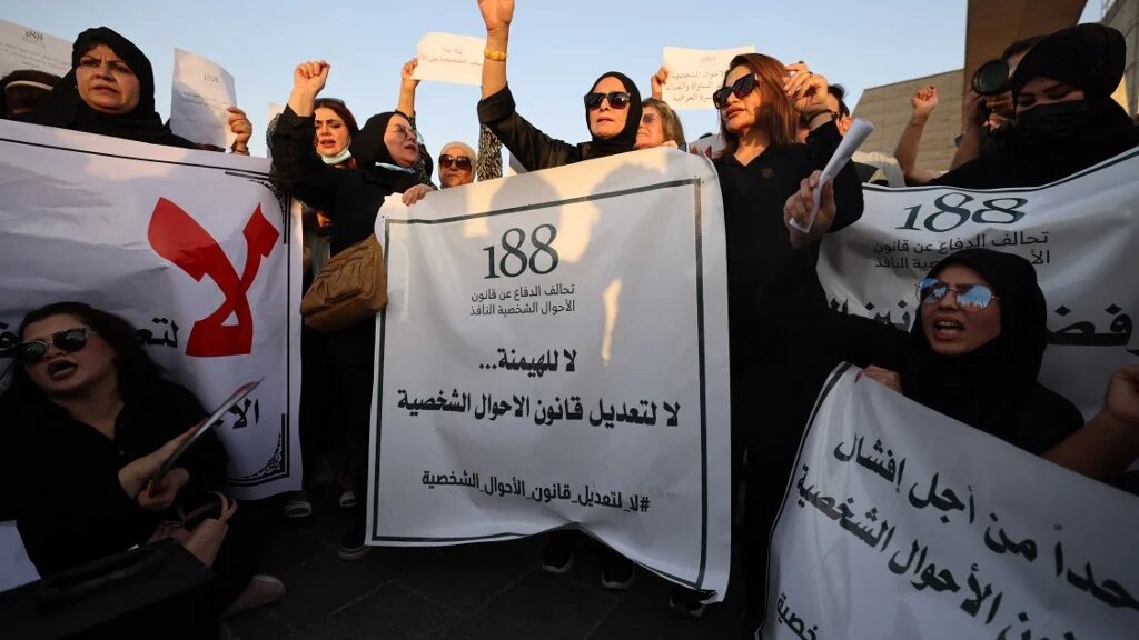 Iraqi women demonstrate against underage marriage in Tahrir Square in central Baghdad on August 8, 2024, amid parliamentary discussions over a proposed amendment to the Iraqi Personal Status Law (Ahmad Al-Rubaye / AFP)