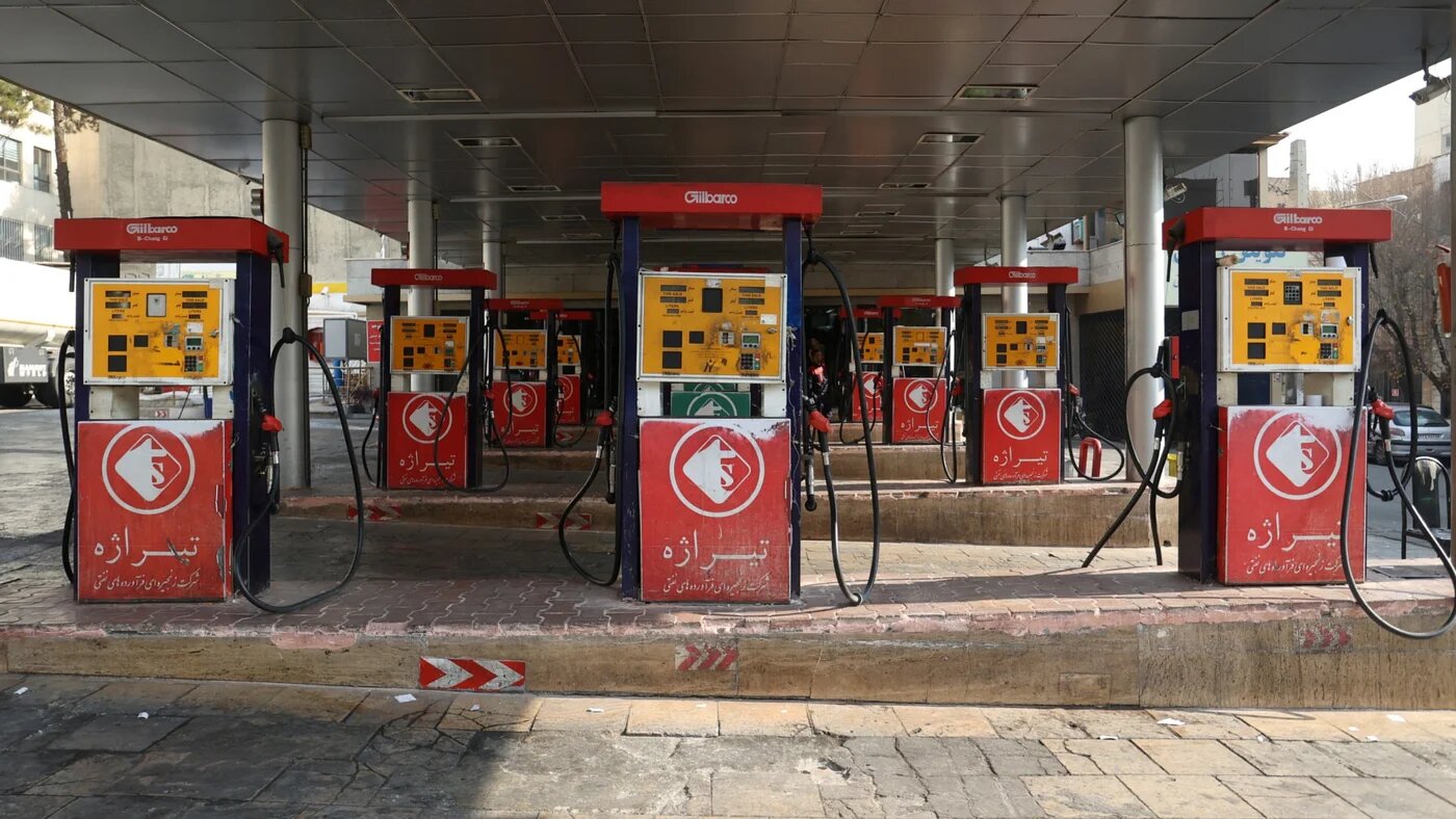 Business at a gas station in Tehran is disrupted on 18 December 2023 after a cyberattack (Majid Asgaripour/Reuters)