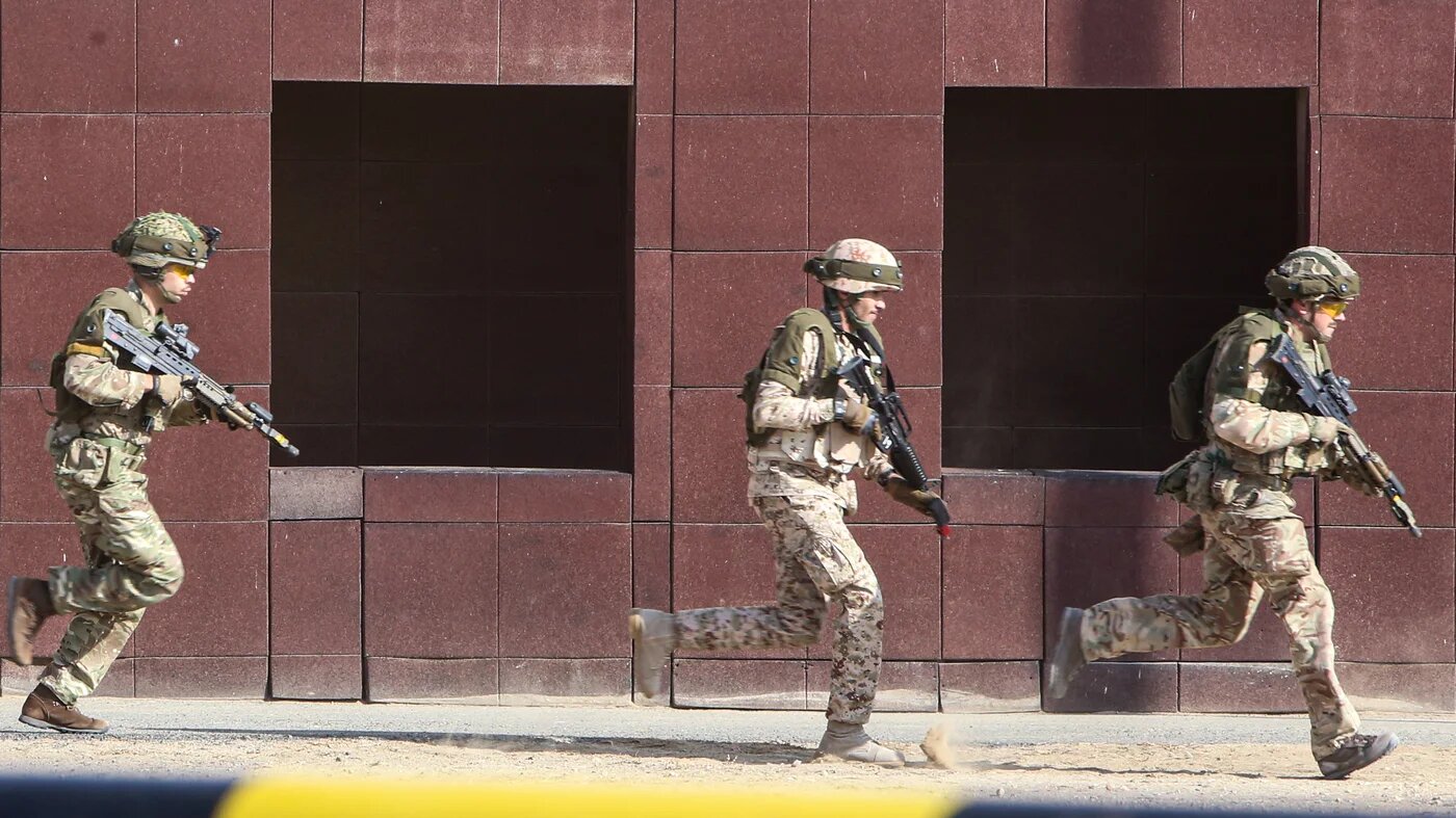 Kuwaiti and British soldiers take part in exercises about 40km north of Kuwait City