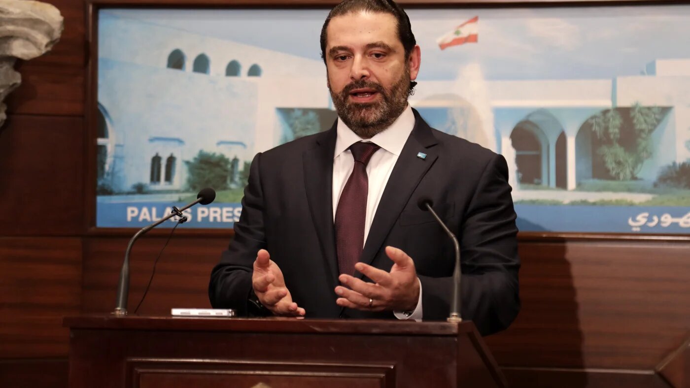 Lebanese Prime Minister Saad Hariri addresses the media after announcing the new cabinet (AFP)
