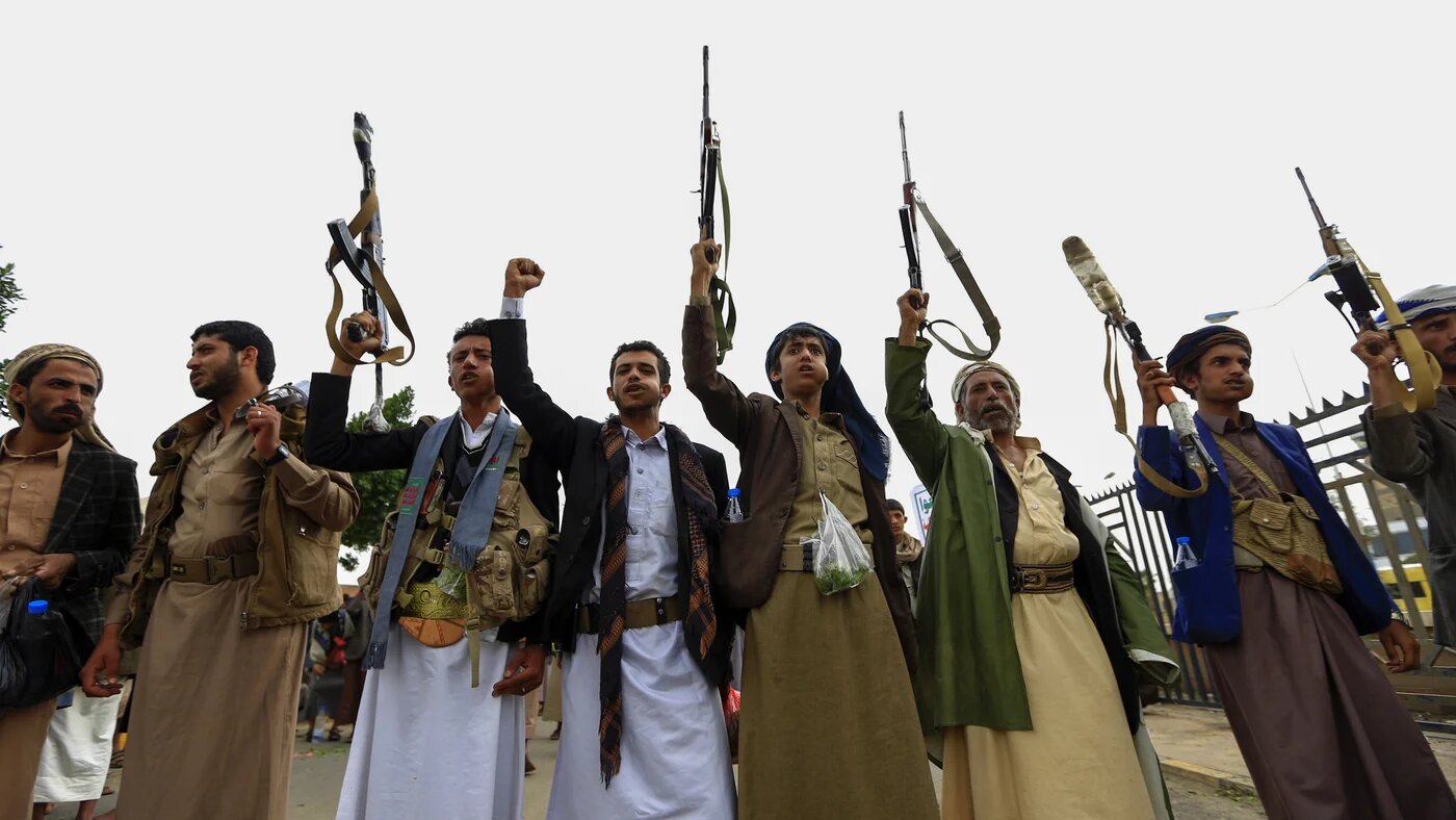 Tribal gunmen loyal to Yemeni Houthi movement take part in rally in Sanaa