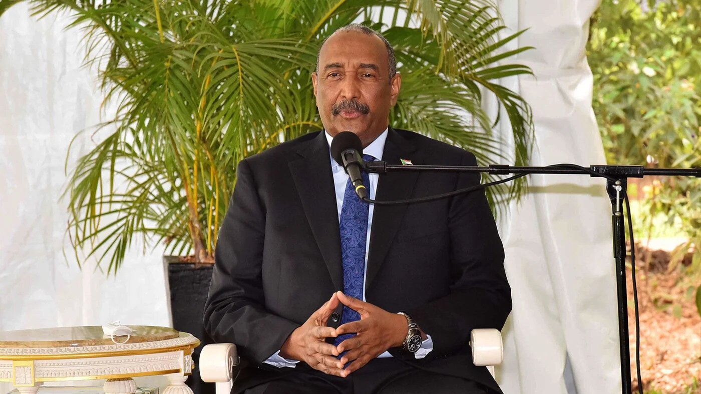 General Abdel Fattah al-Burhan during talks with Ugandan President Yoweri Museveni (not pictured) at the State House, Entebbe, on 17 March 2022 (AFP)