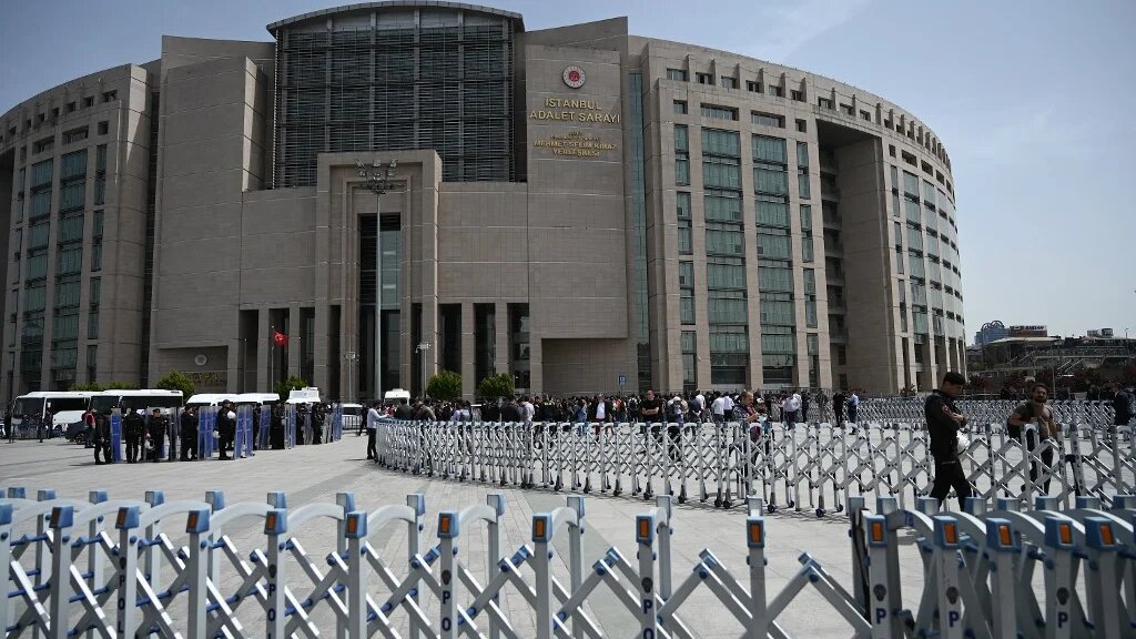 Turkish anti-riot police stand outside the Istanbul courthouse on 26 April 2022 (AFP)
